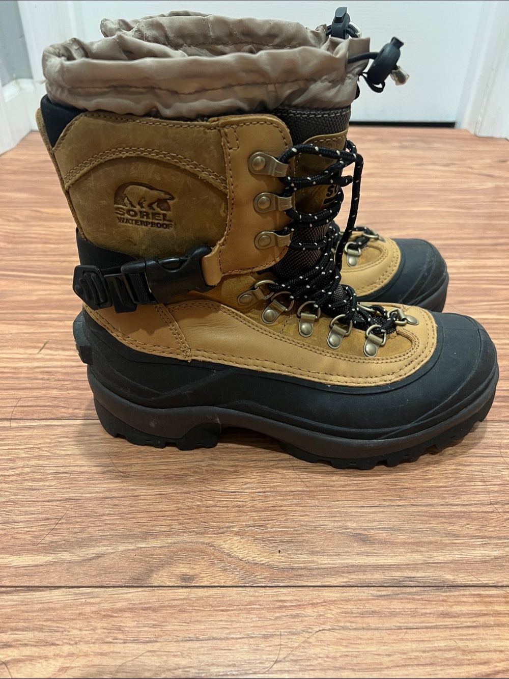 Sorel mens Waterproof Snow Boots in Tan and Black